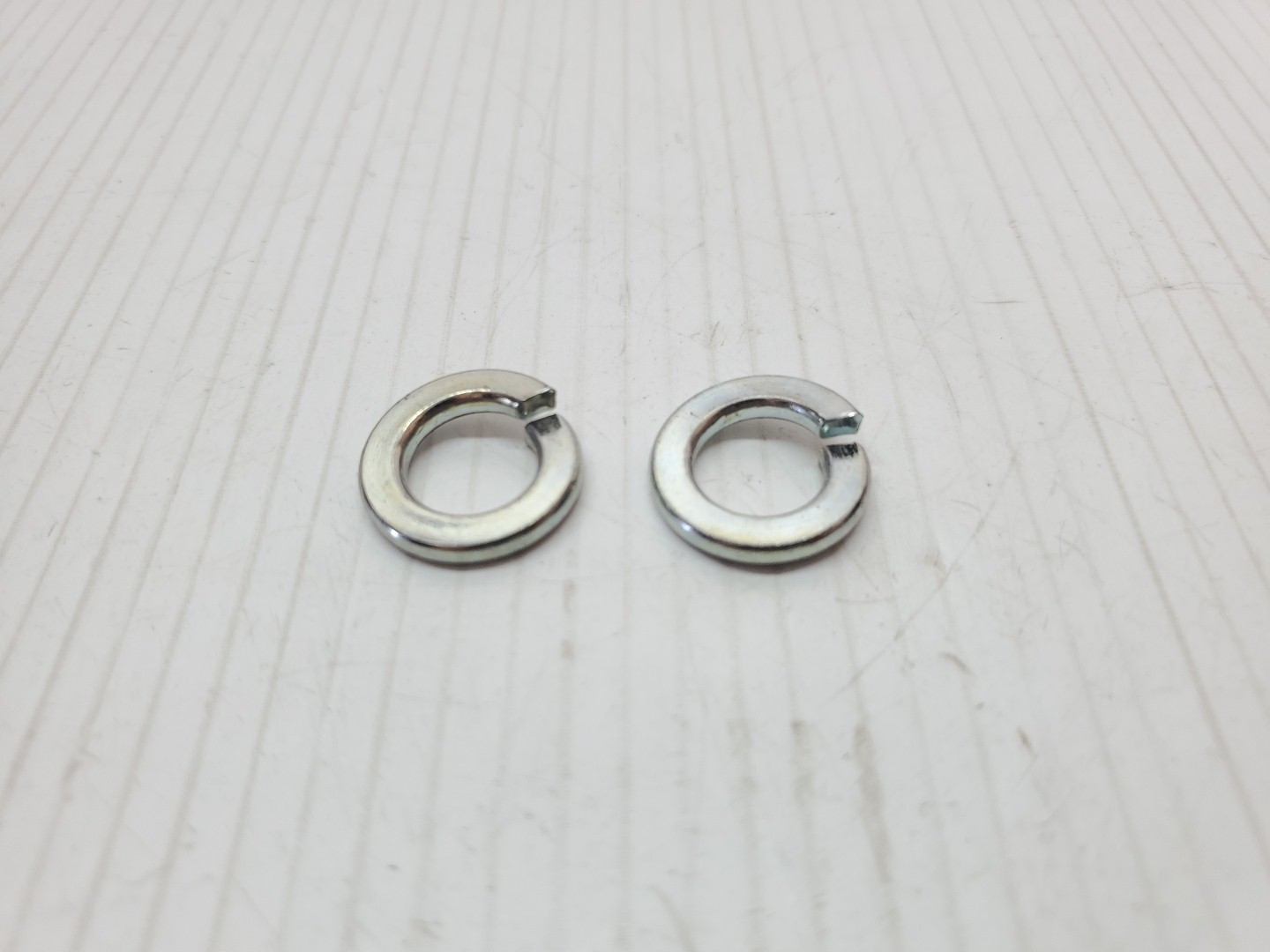 New Kawasaki KD 80 KAF 400 KE 100 Pair of 12mm Spring Washers 461F1200 NOS