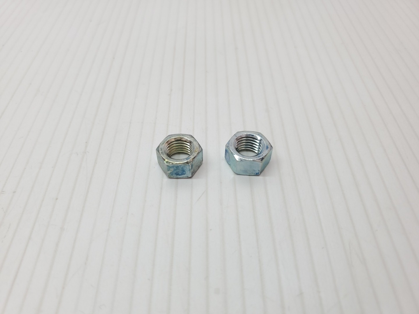 New Kawasaki KE 100 KD KDX 80 KZ 1000 Pair of 10mm Hex Nuts 314B1000 NOS